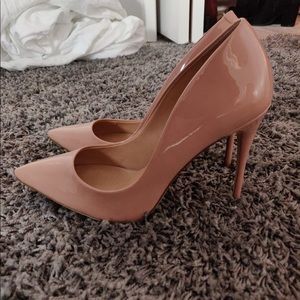 Nude pointy toe pumps